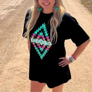 Black tee shirt dress with brightly colored Aztec print.